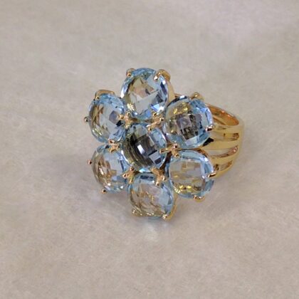 Anello fiore topazio azzurro