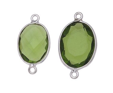 OVALE IRREGOLARE C/BORDO ARG. 925 C/2 ANELLI CIRCA 13*17 MM. VERDE MUSCHIO