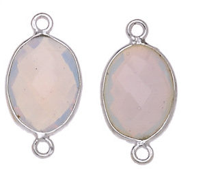 OVALE IRREGOLARE C/BORDO ARG. 925 C/2 ANELLI CIRCA 13*17 MM. QUARZO ROSA