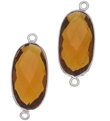 OVALE C/BORDO ARG. 925 C/2 ANELLI 11*20 MM. QUARZO MADERA