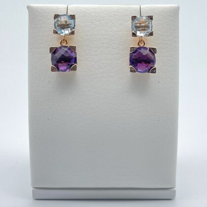 Long earrings with two stones