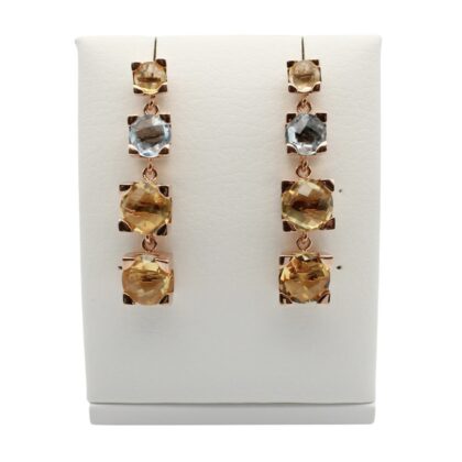 Long earrings with four stones