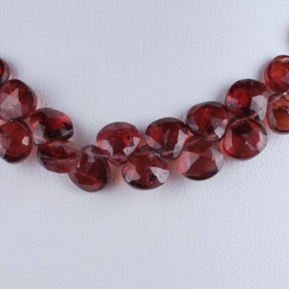 Filo di gocce piatte a castagna, granato